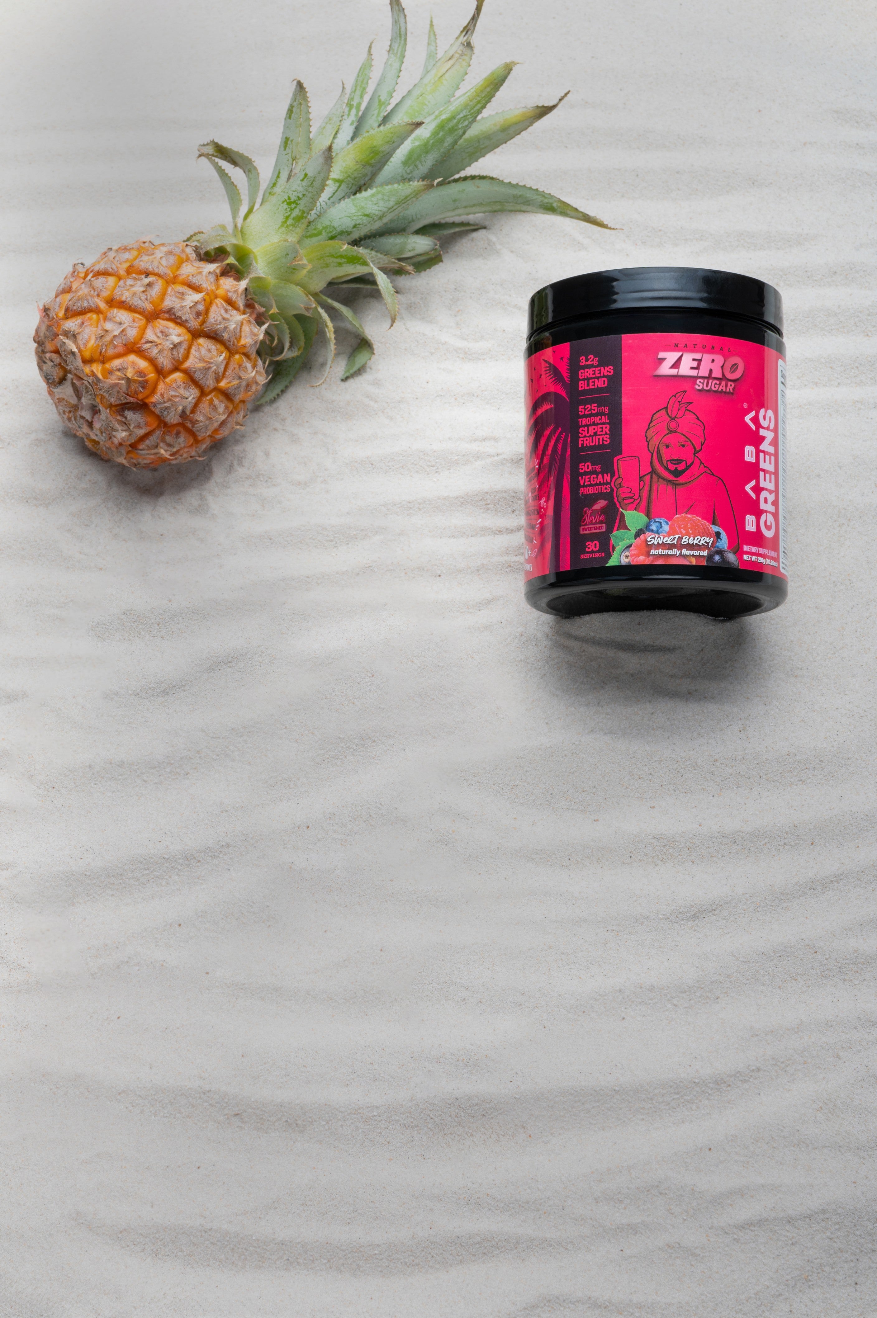 Baba Greens container with a pineapple on a textured surface